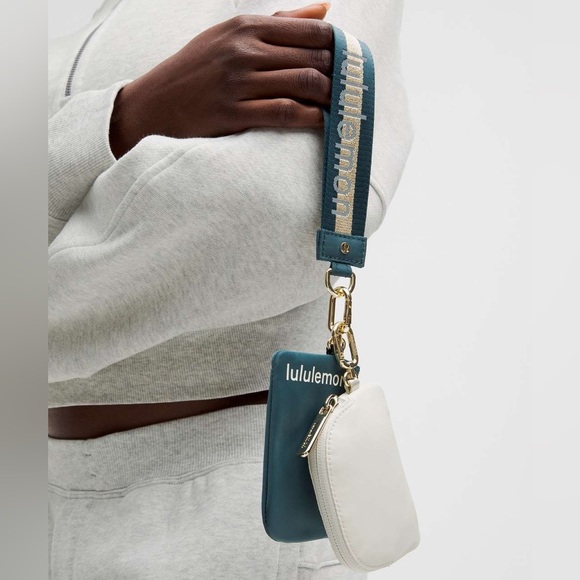 lululemon athletica Accessories - 77🆕💚 Lululemon Dual Pouch Wristlet Wordmark - Warp Teal Bone Gold